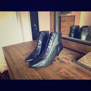 Black leather lace-up kitten heels